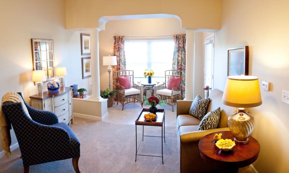 Furnished apartment living room with a sofa and table lamps