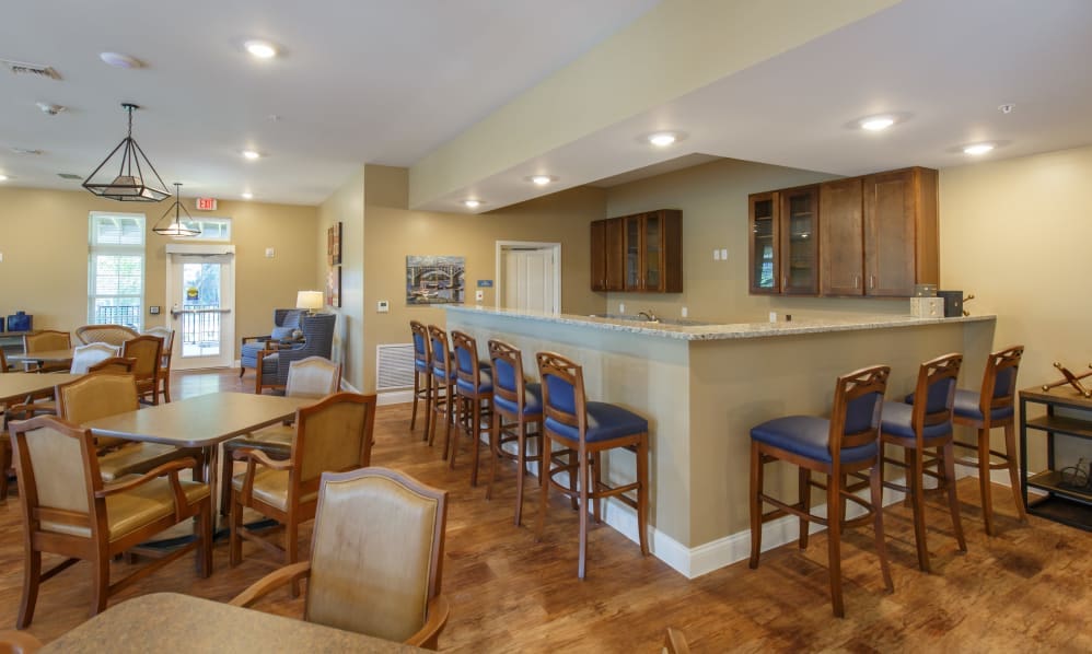 Bistro with bar seating and dining tables