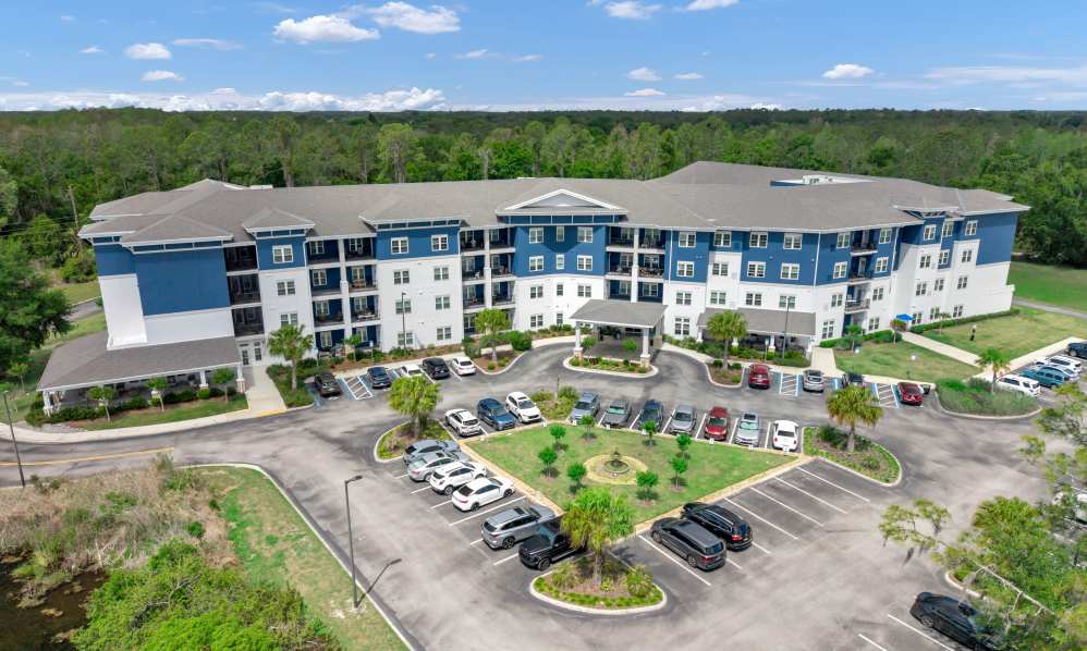 Aerial view of Charter Senior Living at Terra Bella and its landscaped entrance